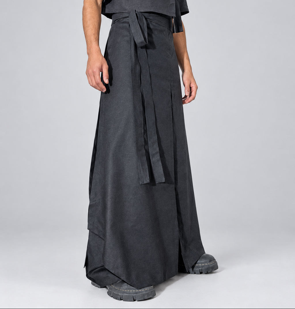 Falda cruzada larga unisex en lino y algodón negro, vista frontal · ANATHEMA