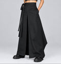 Falda cruzada larga unisex en lino y algodón negro, vista frontal · ANATHEMA